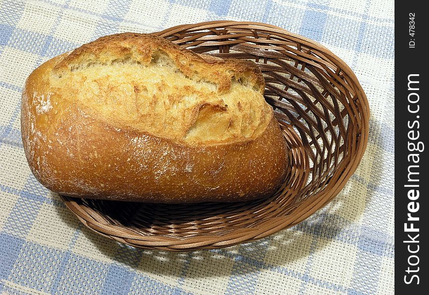 Fancy baked bread in a woven basket. Fancy baked bread in a woven basket