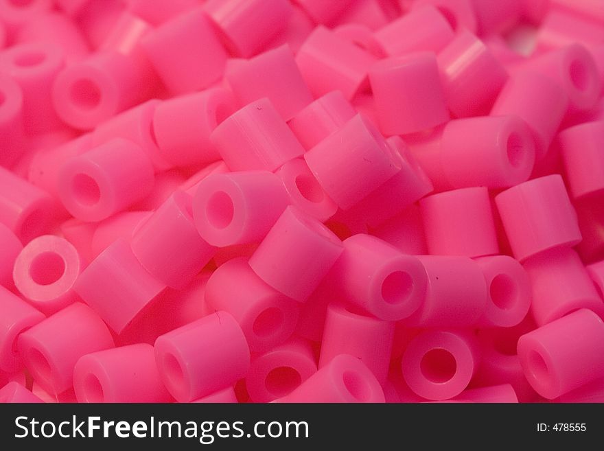 Group of pink plastic beads