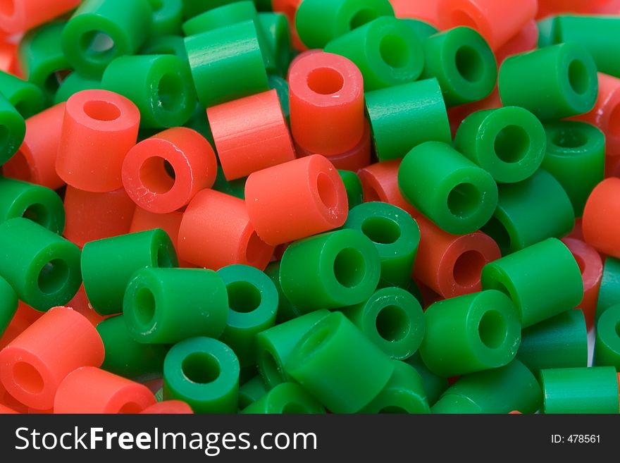 Group of red and green plastic beads