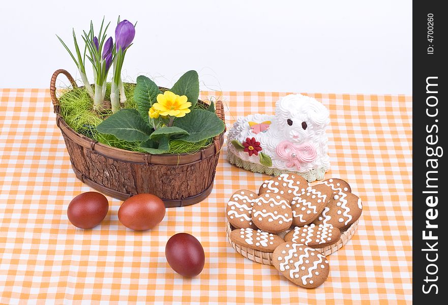 Easter still-life- flower, ewe-lamb, eggs, gingerbread