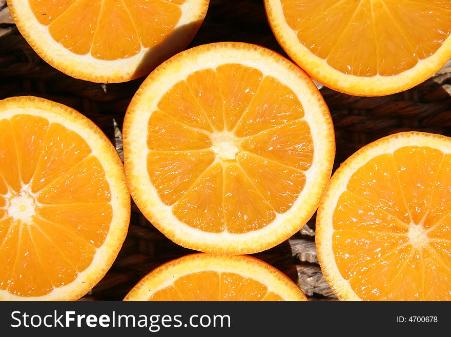 Juicy oranges show their inside. Juicy oranges show their inside