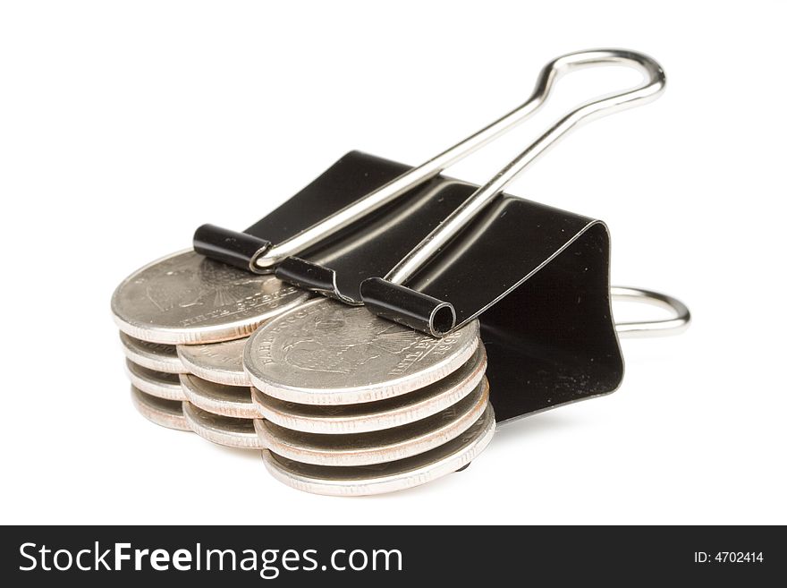 Coins Clamped By A Paper Clip