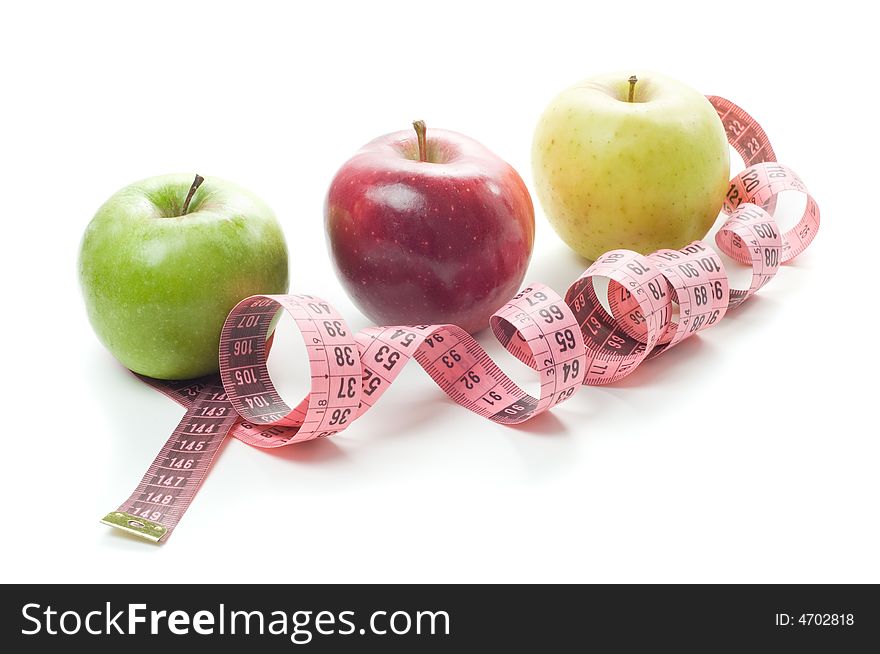 Apples and tape measure isolated on a white background