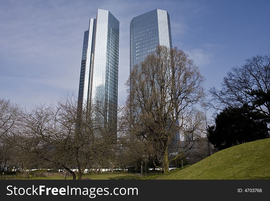 Two towers close to a park in Frankfurt, Germany.