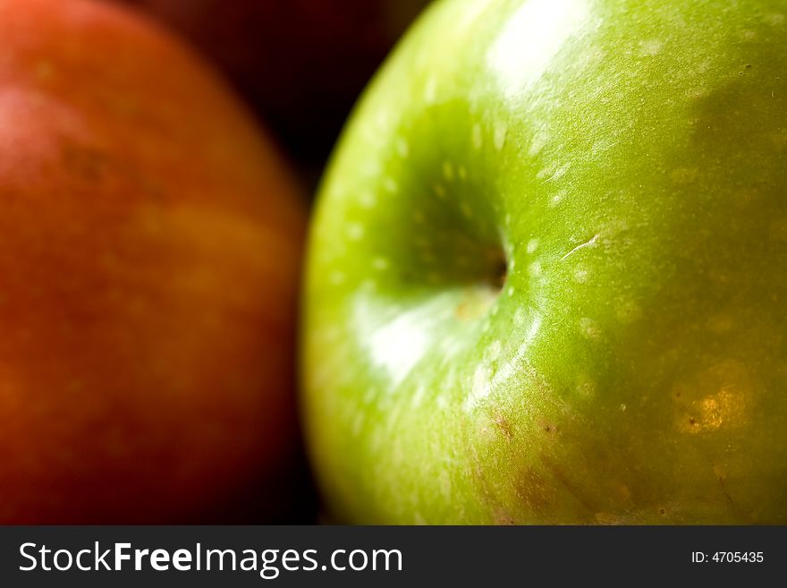 Macro shot of fresh ripe apples washed with water