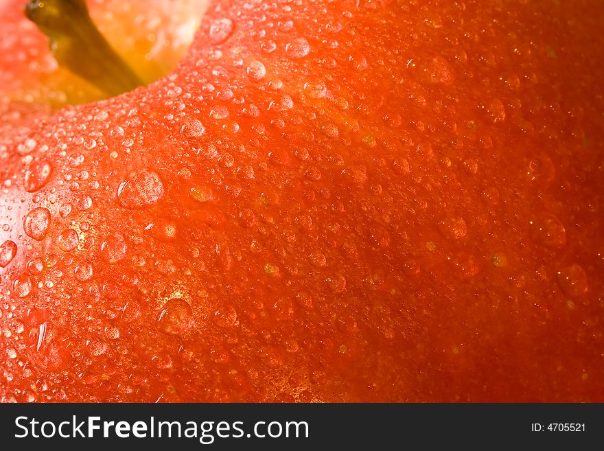 Macro shot of fresh ripe apples washed with water