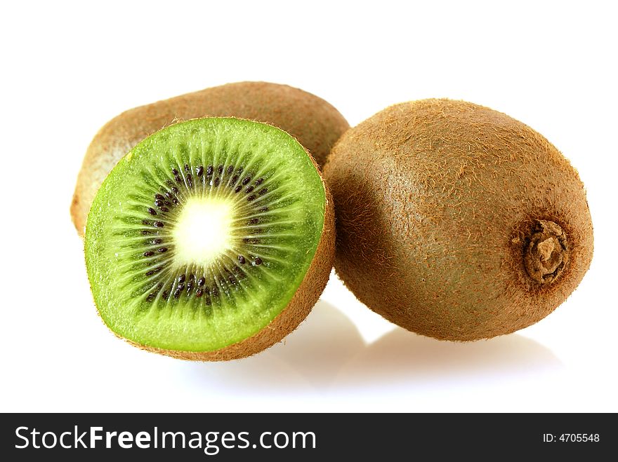 Two kiwi fruites with half over white background