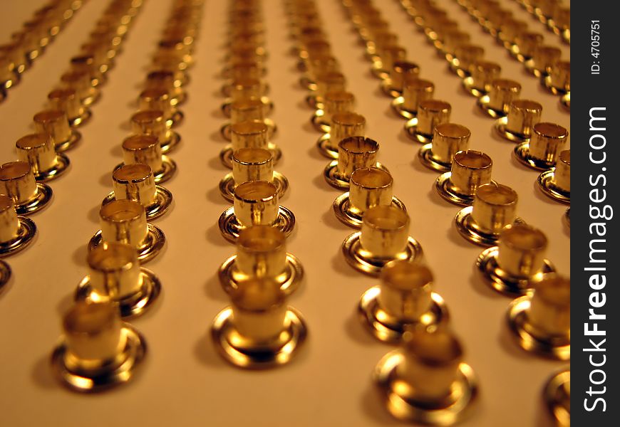 Group Of Gold Rivets.