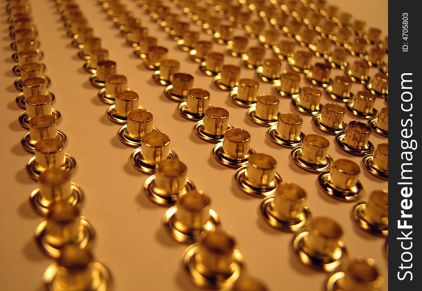 Group Of Gold Rivets.