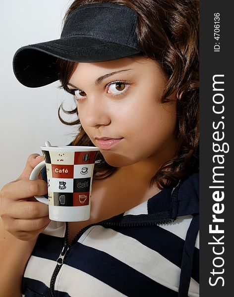 Teenage girl with a mug