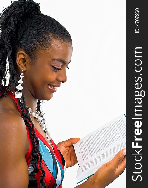 Lovely young africanlady with a book