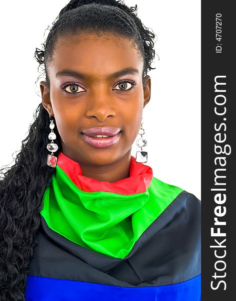 Attractive pretty african girl wrapped in a colorful shawl