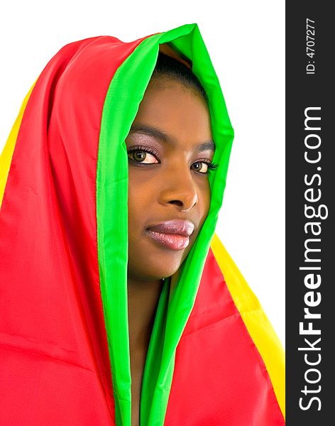 Attractive pretty african girl wrapped in a colorful shawl