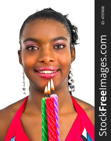 Beautiful young woman with three colored candles