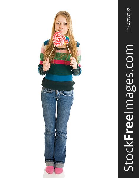 The girl with a sugar candy isolated on a white background