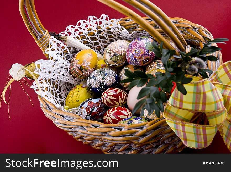 Easter eggs in a traditional easter basket. Easter eggs in a traditional easter basket