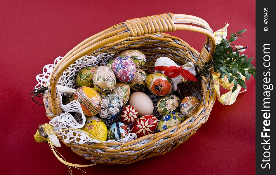 Easter eggs in a traditional easter basket. Easter eggs in a traditional easter basket