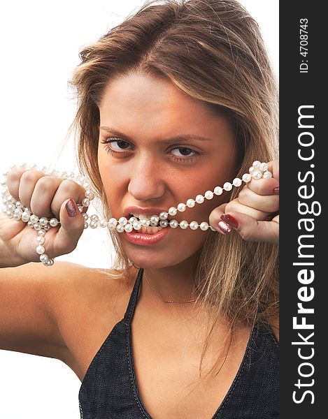 Portrait of aggressive girl  with pearl necklace on white