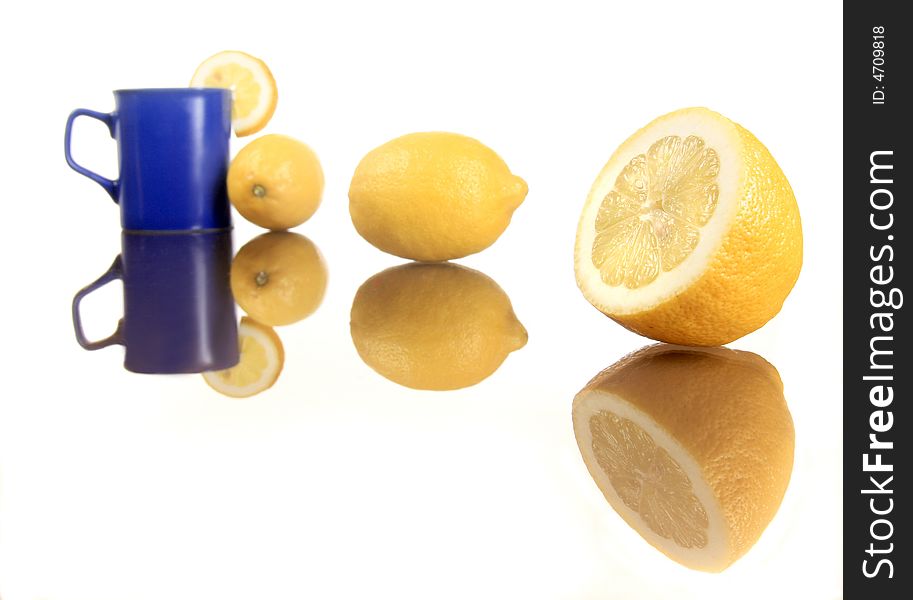 Diagonal shot of a lemons and blue mug 3