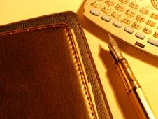 Notebook Pen And Pocket PC Royalty Free Stock Images