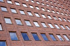 Front Of A Brick Building And A Nice Blue Sky Royalty Free Stock Photography Front Of A Brick Building And A Nice Blue Sky Royalty Free Stock Photography