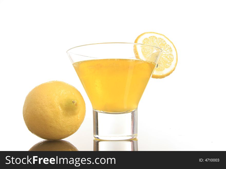 Fresh lemonade with lemons on the white. Fresh lemonade with lemons on the white