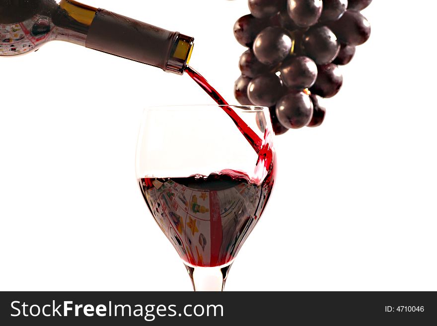 Red wine with a bottle on a withe background.