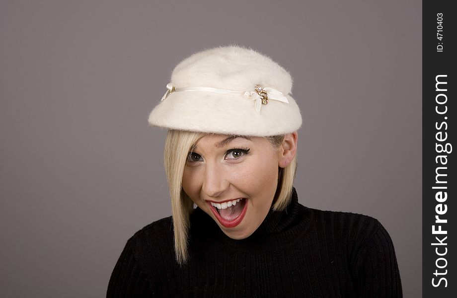 Blonde in White fur Hat Happy