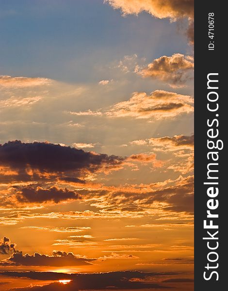 Veiw series: orange sunset with clouds and blue sky