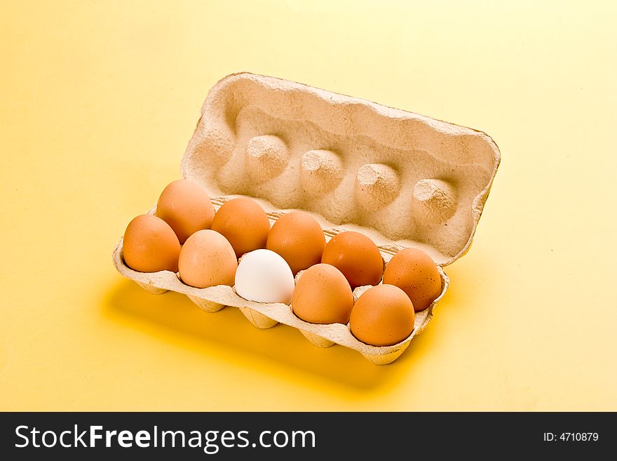 Food series: paper box with eggs white and brown