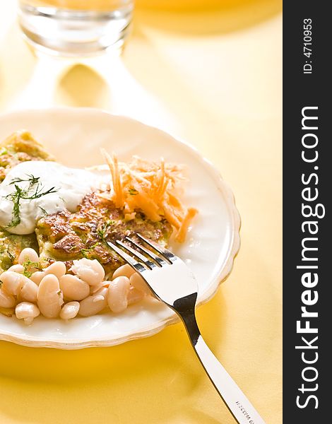 Food serias: fried veggy with sour cream, carrot, and kidney beans. Food serias: fried veggy with sour cream, carrot, and kidney beans