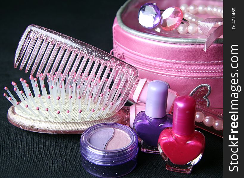 WomenÂ´s accessories, comb, brush, ring and make up, nail enamel. WomenÂ´s accessories, comb, brush, ring and make up, nail enamel