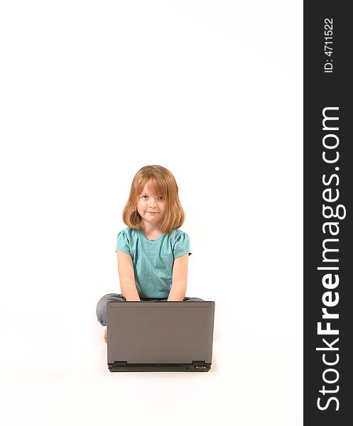 Isolated young girl using a laptop