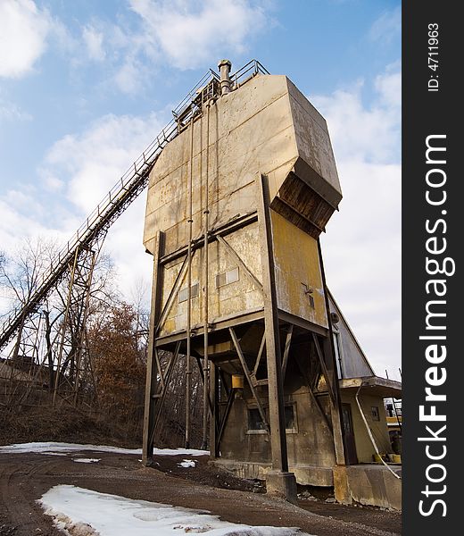 Old weathered industrial cement silo