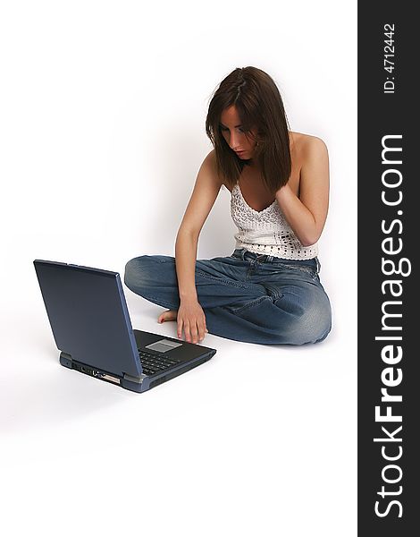 Girl with laptop in studio