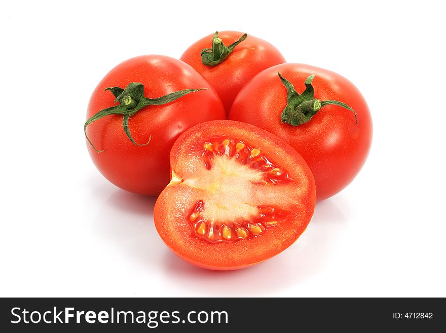 Fresh tomatoes with cut on white background