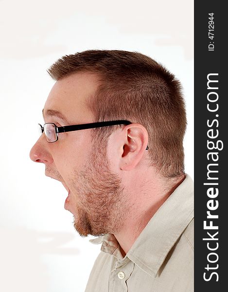 Man with glasses screaming on white background. Man with glasses screaming on white background