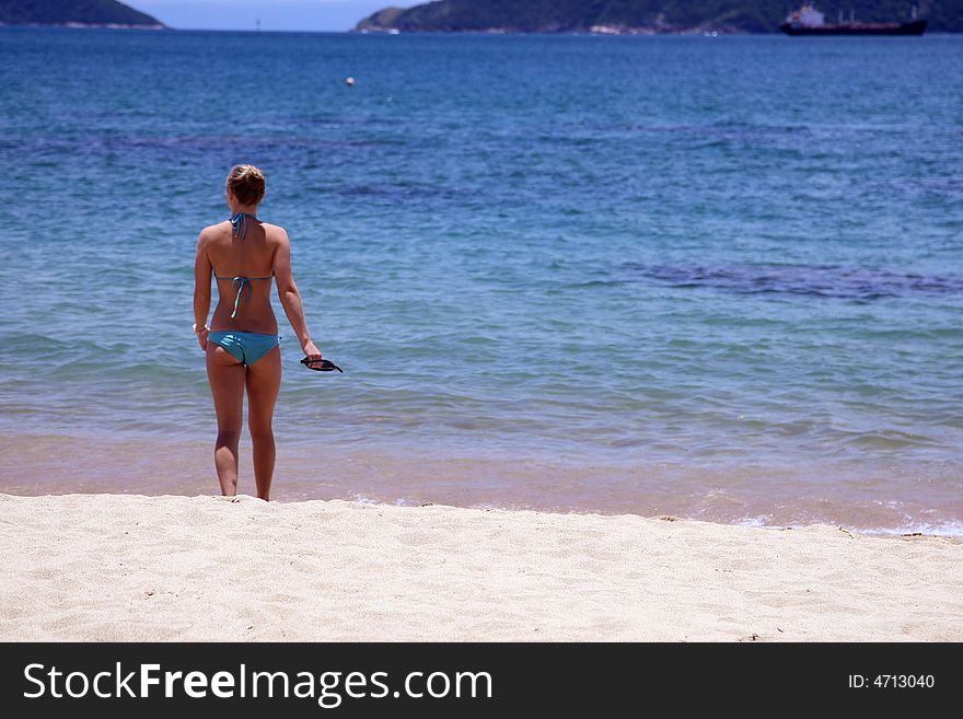 Young woman playing on the beach. Young woman playing on the beach