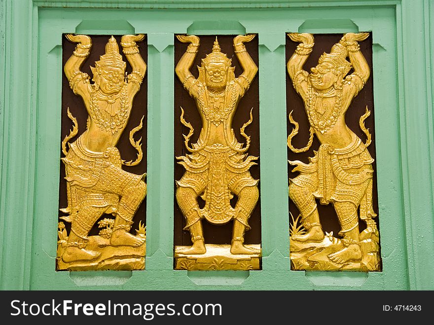 Buddhist temple demons made of wood