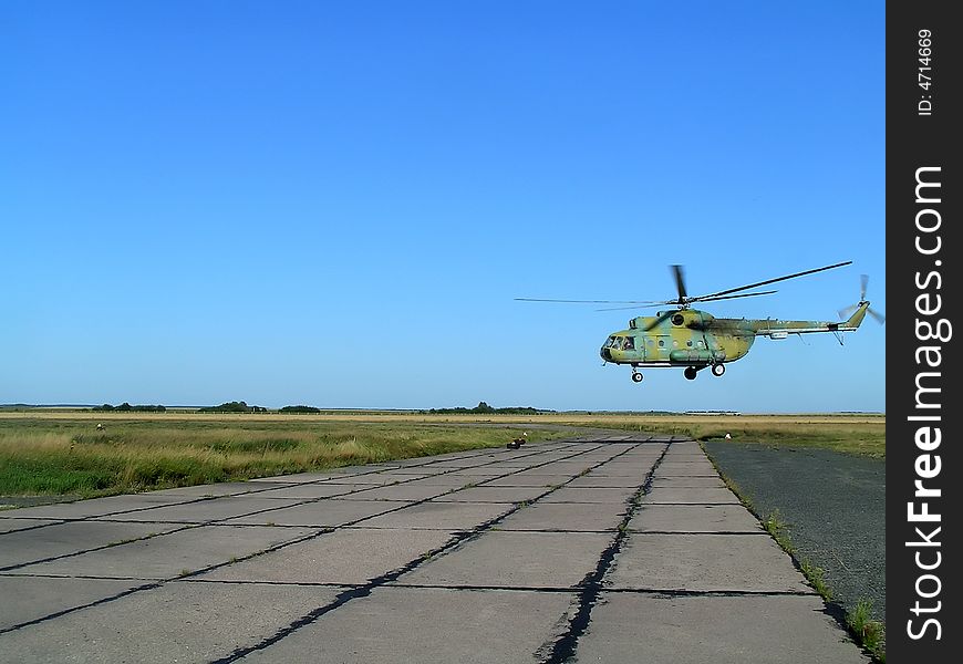 Helicopter in blue sky