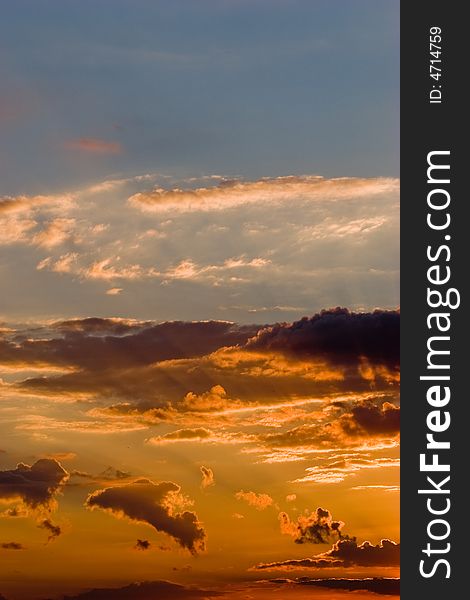 Veiw series: orange sunset with clouds and blue sky