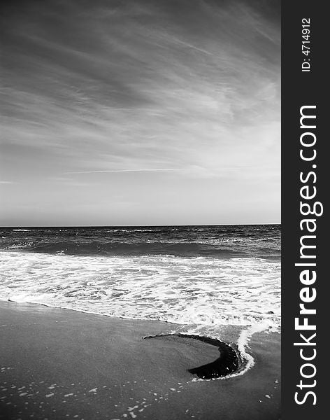 Wheel at the beach in sea