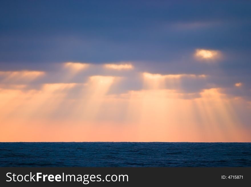 Golden Sun Beams Shining Over The Ocean. Golden Sun Beams Shining Over The Ocean