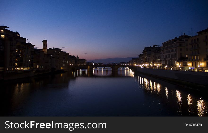 Sun nearly down on fiume arno in florence, italy. Sun nearly down on fiume arno in florence, italy.