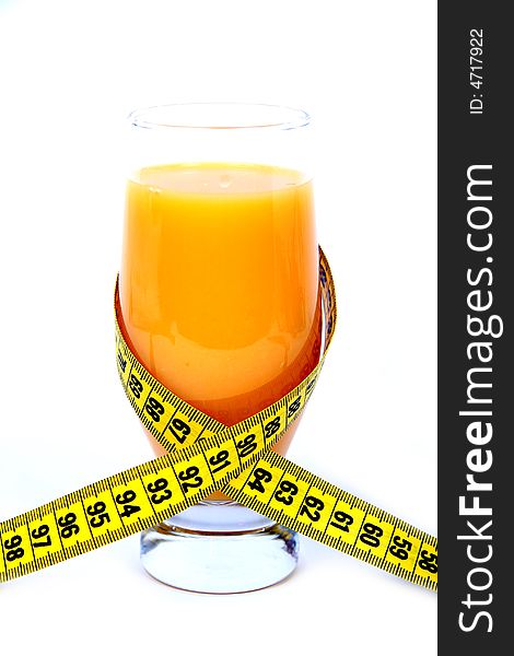 Orange juice and measuring tape on white background. Orange juice and measuring tape on white background.