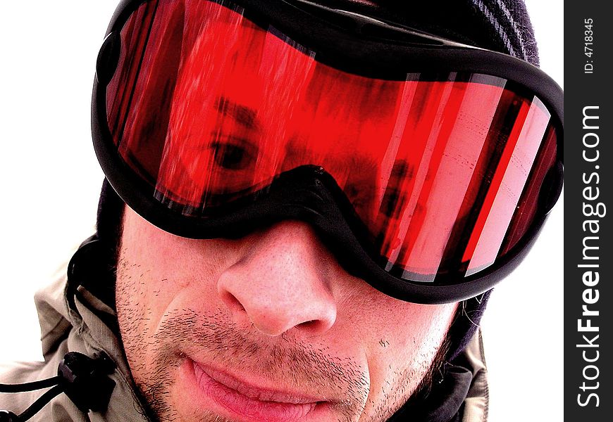 Face of a Snowboarder guy in goggles.