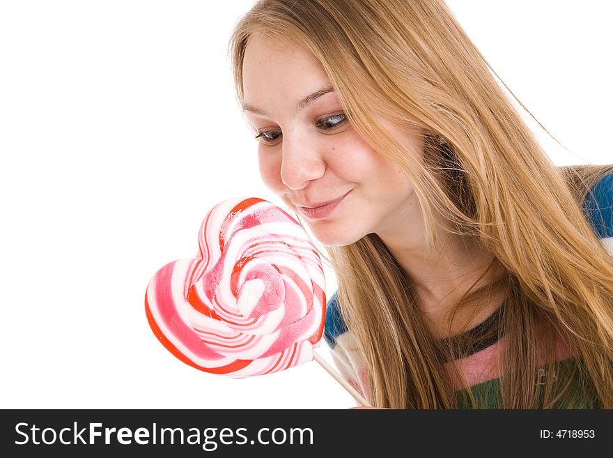 The girl with a sugar candy isolated on a white background