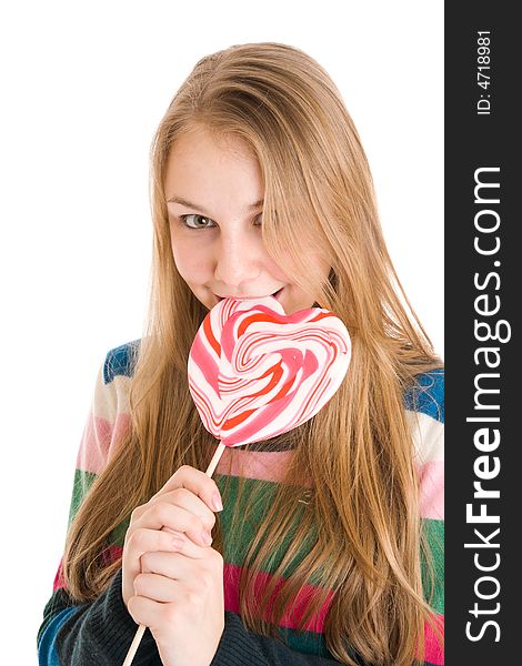 The girl with a sugar candy isolated on a white background