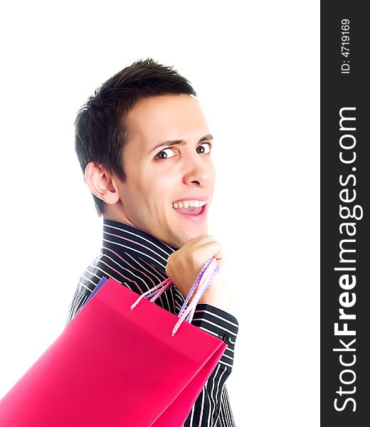 Young man holding shopping bags