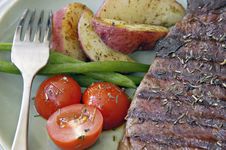 Steak With Potatoes, Tomatoes, And Beans Stock Photo Steak With Potatoes, Tomatoes, And Beans Stock Photo